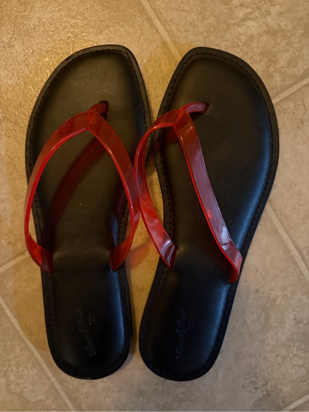 Red jelly flip flops
